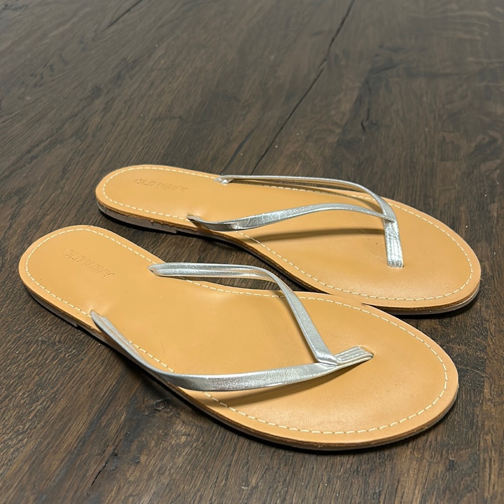 Sliver flip flops never worn